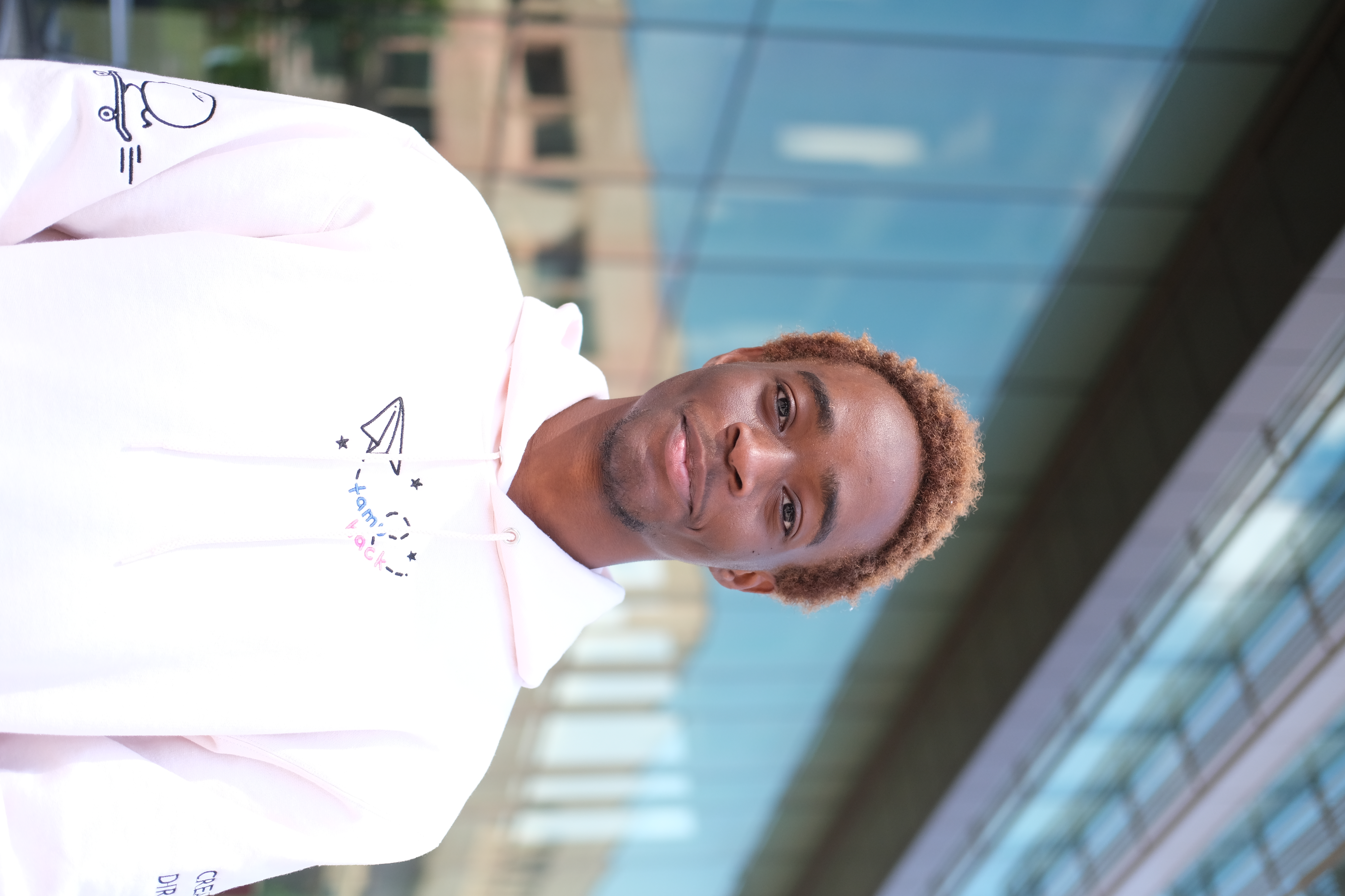 headshot of Ayo
